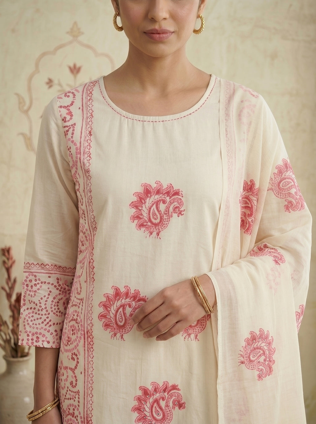 Close up of pink paisley print and round neckline on cotton kurti set