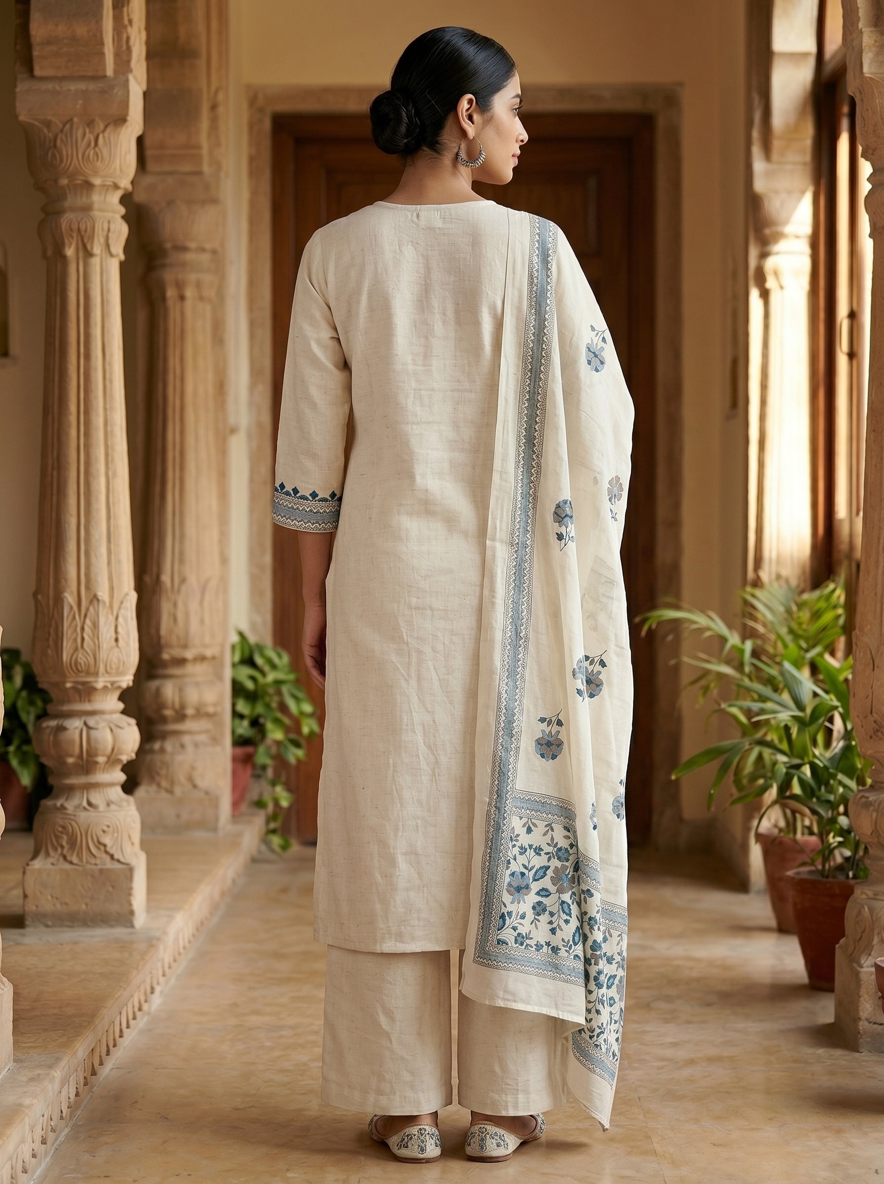 Back view of ivory cotton kurti set with blue printed dupatta